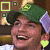 Animated icon of a person wearing green cap with purple side flaps and light green emblem, smiling broadly with mouth open showing teeth.