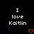Two identical pixelated text display "I love Kaitlin" with red heart symbols below each on a black background