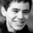 Black-and-white photo of a smiling person on left, green background with cyan text reading 'David Archuleta is my Future HUSBAND' in pixelated font.