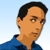 Pixelated portrait of a person with short dark hair wearing a blue collared shirt against light blue background.