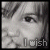 A black-and-white of nine identical facial close-ups with changing text overlays reading 'I wish', 'I was', and 'happy'