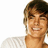 Pixelated image of a person with brown hair wearing a white shirt, next to blue background with text.
