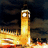 Animated sequence showing a clock tower with illuminated clock face against dark sky, transitioning from full view to partial view.