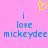 A static pixel art image with a pink background, yellow heart symbol at top center, and blue text reading "i love mickeydee" in two mirrored