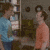 Animated contact sheet showing two frames of a cartoon character in blue shirt and another in orange shirt interacting with objects on shelves.