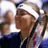 Static 48x48 pixel icon depicting two figures in a tennis match with blurred motion effects and visible dithering artifacts.