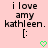 Pixelated text on a light pink background with two identical static frames showing 'i love amy kathleen.' and a green heart symbol.