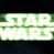 Static pixelated green and white icon with abstract geometric shapes resembling stylized text or symbols on a dark background.