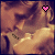 A 2x2 contact sheet of three animated frames showing a pixelated couple kissing with heart icons in the top-right corner, displayed on a gray background.