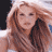 Static 48x48 pixel icon showing a close-up of a person with long brown hair against a light background, rendered in low-resolution pixel art style.