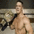 A shirtless man holding a championship belt in one and flexing his muscles in another, with orange text reading "Hottest Men Alive" below