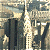 Static image of a pixelated cityscape with tall buildings and a bright light source, alongside green text reading 'Original Icons .com' on dark background.