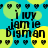 Pixelated blue background with repeating yellow circular shapes and black text reading 'i luv jamie bigman' in a pattern