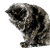 A tabby cat with dark stripes sits in a crouched position, its head turning from left to right