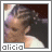 Alicia Keys in a white top with braided hair, shown in a of with varying head angles and expressions