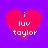 Four identical red heart shapes on a purple background, each containing white text reading "i luv taylor" in a pixelated font.