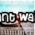 A beach scene with two sandwiches on a wooden surface under a blue sky, where text partially obscures the image.