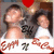 A pixelated image of two people in a photo booth setting with red heart and gold balloon decorations, featuring repeated text elements at the bottom.