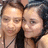 Two pixelated faces in close proximity, one with light brown hair and the other with dark hair, both wearing dark tops against a blurred background.