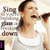 A pixelated image of a woman in a white top with text and symbols overlaid, including 'IDINA' on a black background.