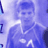 Static 48x48 pixel icon with blue-toned figure in motion, likely a soccer player, against light background with partial grid elements on left edge.