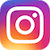 A square-shaped icon with rounded corners featuring a gradient background transitioning from blue at the top to orange and yellow at the bottom, containing a white-bordered camera symbol.