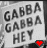 Black-and-white pixelated text 'GABBA GABBA HEY' with red and white heart icons at bottom right.