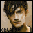 nine pixelated images showing a person with dark tousled hair against a beige background, each displaying the word 'ORLANDO' in red text below