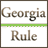 Static pixel art icon with brown text 'Georgia' above a green horizontal stripe and brown text 'Rule' below it on a white background.