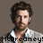 A pixelated image of a man with brown curly hair and light stubble wearing a white collared shirt against a solid gray background, with text reading "McDreamey!" below.