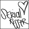 Black handwritten text 'Serial Killer' with a heart symbol above the letter 'l', on a white background.