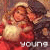 A child in red clothing and a hooded cloak holds a white bundle, with text below changing from 'young' to 'love'.