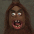 Pixelated close-up of a character with long brown hair, wide eyes, and an open mouth showing teeth against a dark gray background.
