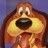 Pixelated cartoon mouse with large eyes and a black nose, rendered in warm brown and yellow tones against a blue background.