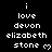 Pixelated text displays 'i love devon elizabeth stone' with a heart symbol on black background, repeated in three and one below