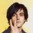 Static 48x48 pixel buddy icon showing a person with dark hair against a yellow background, rendered in low-resolution pixel art style with visible dithering and anti-aliasing.