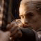 A pixelated image shows a person with light hair holding a bow, next to text reading ...and you have my bow..