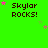 Green background with repeated 'Skylar Rocks!' text and scattered pink stars in a