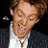 A 48x48 pixel buddy icon featuring a person in formal attire on the left and green text reading "Original Icons .com" on a dark background, displayed as part of an animated contact sheet with two frames.