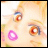 Pixelated close-up of a character's face with large orange eyes, blue eyeliner, and a pink cheek mark on a light background.