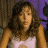A pixelated contact sheet showing two frames of an animated icon featuring a woman with long brown hair in a white tank top next to the word 'honey' in blue block letters on a dark background.