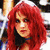 A pixelated image of a person with long red hair wearing a white top, overlaid with text reading "SULCE MARIA IS MY LIFE!" and multiple red hearts.