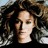 A 4-frame animated contact sheet showing a woman with long wavy brown hair in black and white clothing against a gray background, captured from an AOL Instant Messenger buddy icon animation.