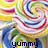 A colorful swirl of yellow, red, green, blue, and white stripes forms a candy-like pattern with the word 'yummy' in dark blue text at the bottom.