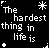 Black background with white pixelated text repeating 'The hardest thing in life is' and 'watching someone you love', surrounded by yellow and white star symbols, ending with 'love someone' and a cursive 'Else' at the bottom.