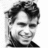 Black-and-white pixelated image of a person with tousled hair, split into four quadrants with text overlays.