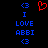Static pixel art displays blue text and symbols on black background with a red heart symbol in center.
