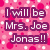 Pink background with white and pink dots, purple text reading "I will be Mrs. Joe Jonas!!" next to a person's face.