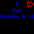 Pixelated text and symbols on black background: blue 'I', red heart, blue 'Luv', blue 'Maddie H <3' repeated twice.