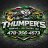 Pixelated image showing a vehicle with 'THUMPERS' text above and partial lower text, set against a blurred background.